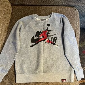 Child’s size large gray Nike Air Jordan sweatshirt
